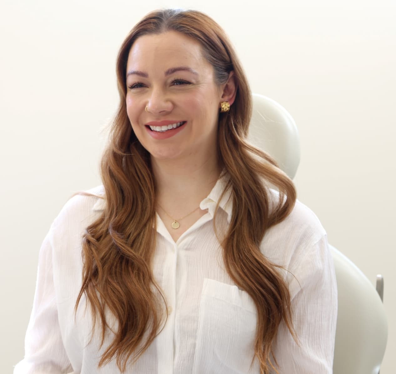 A patient of South Bay Plastic Surgeons smiling