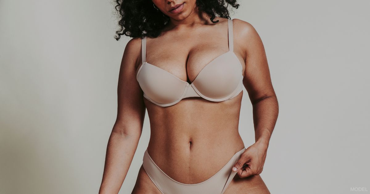 Woman wearing a nude bra and underwear (model)