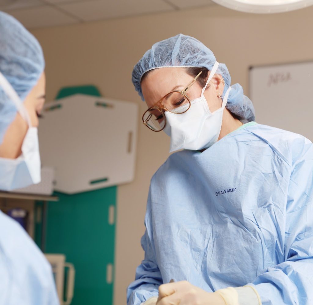 Surgeon preforming an operation