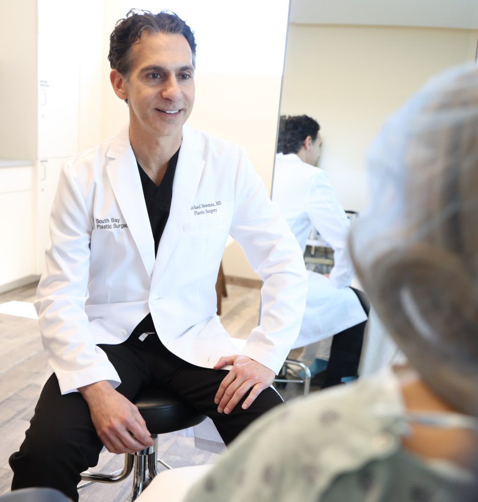 Dr. Michael K. Newman with patient